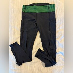 Lululemon Navy Blue Leggings with Green Striped Waistband
Size 10